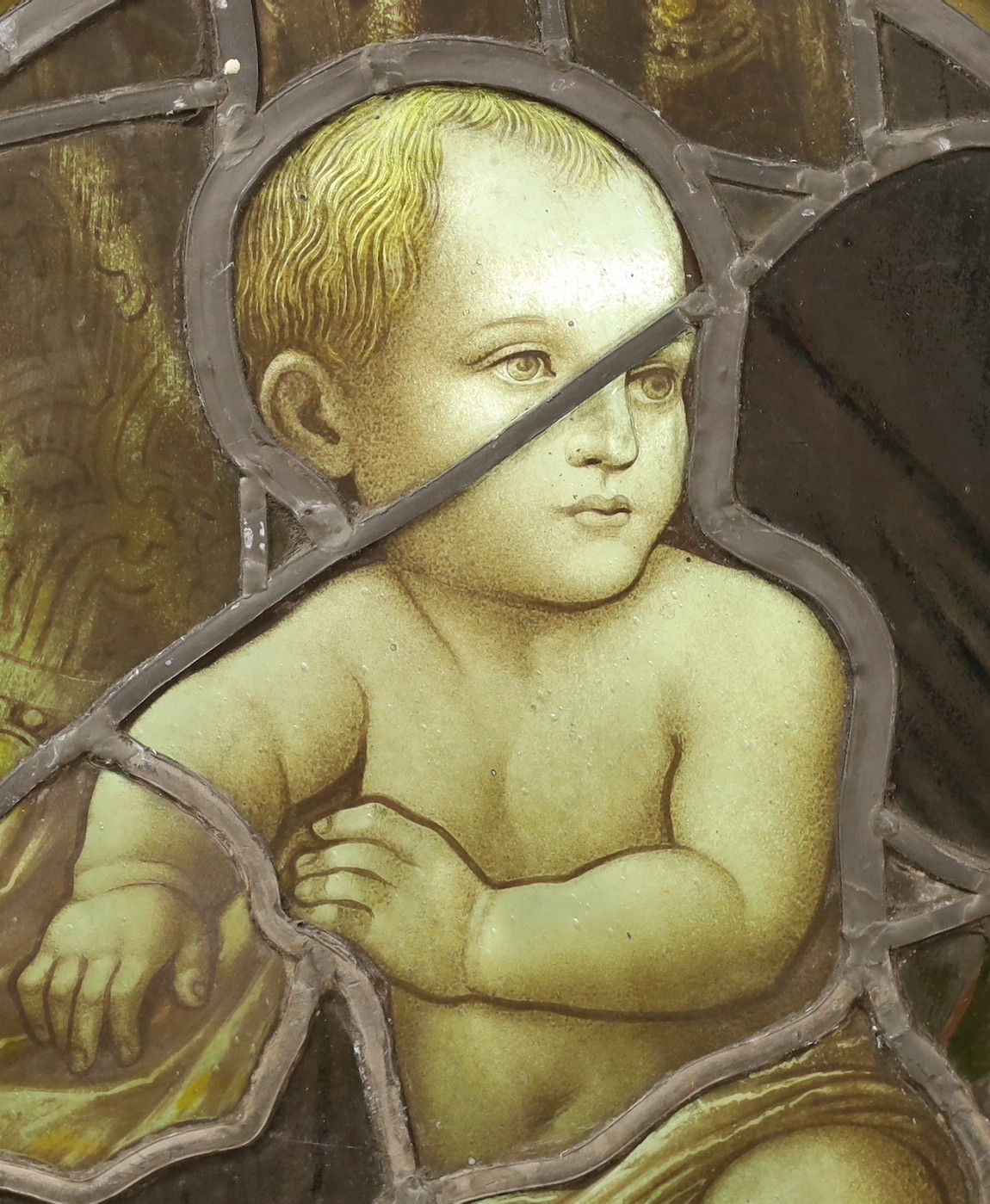 A Victorian stained glass baby Jesus roundel, 43cm